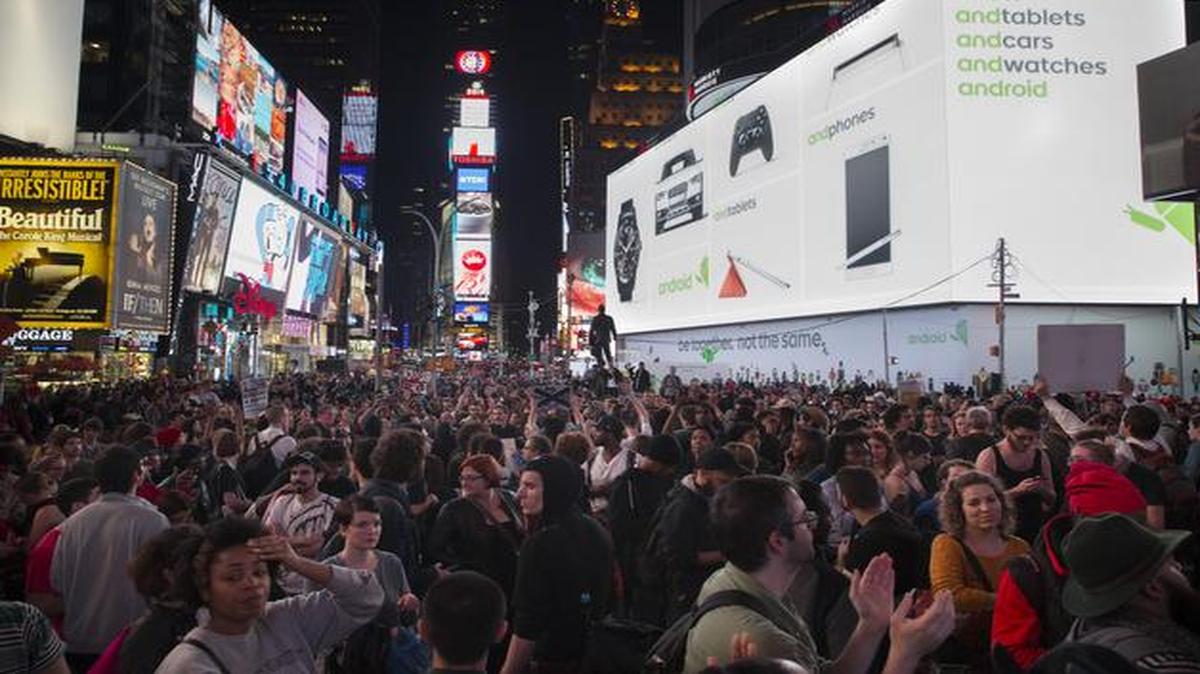 
Protesters fill Times Square during a march after the announcement of the grand jury decision not to indict Ferguson police officer Darren Wilson in the fatal shooting of Michael Brown
