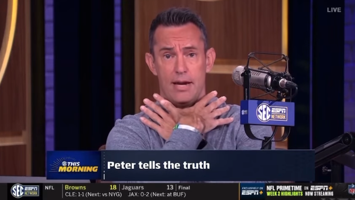 ESPN host Peter Burns said a University of Missouri fan saved his life as he choked on a piece of food.