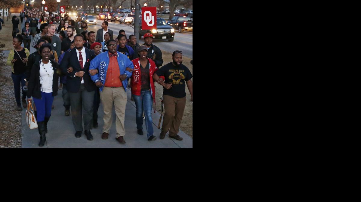 
University of Oklahoma students march to the now closed University of Oklahoma's Sigma Alpha Epsilon fraternity house Tuesday
