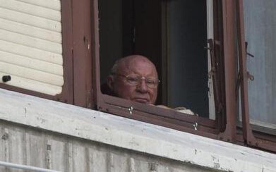 
Jakob Denzinger looks from his apartment window in Osijek, eastern Croatia.
