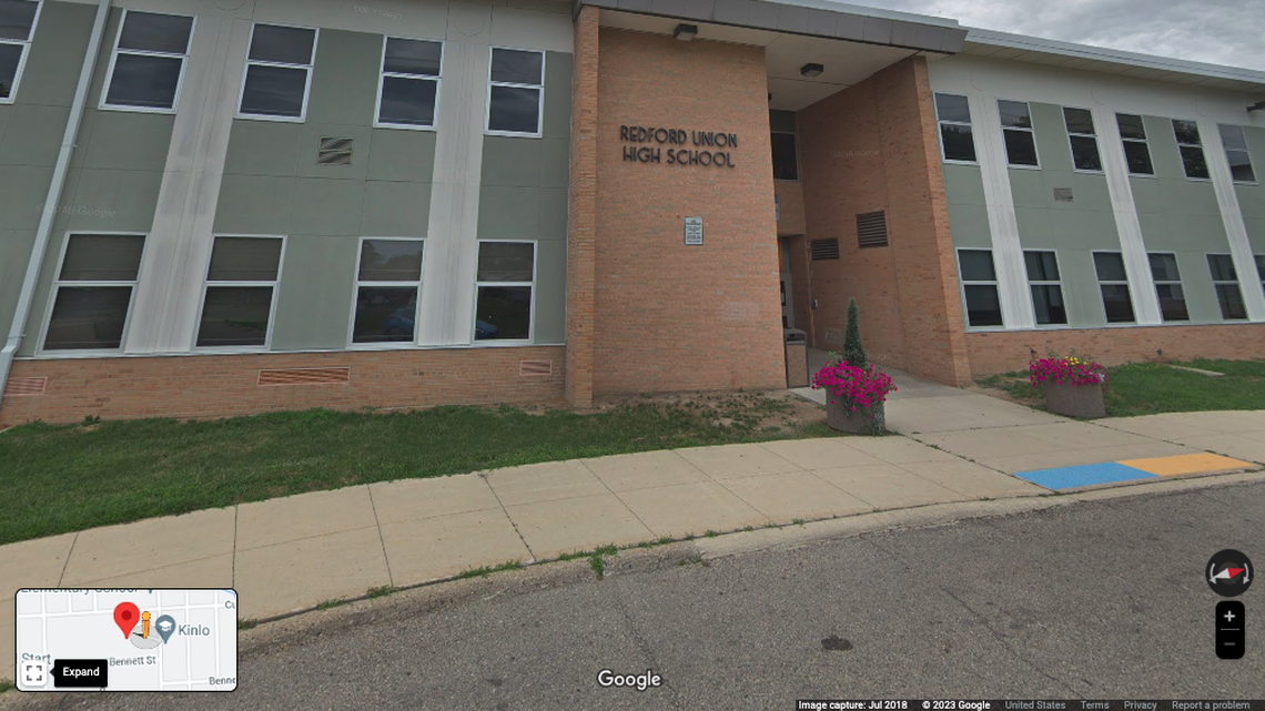 A custodian assaulted a coworker at a Michigan high school, killing him, cops say.