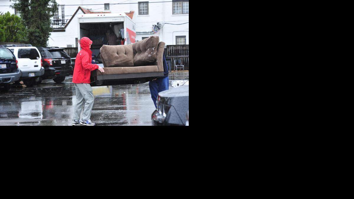 
Students move their furniture out of the Sigma Alpha Epsilon house at the University of Oklahoma 
