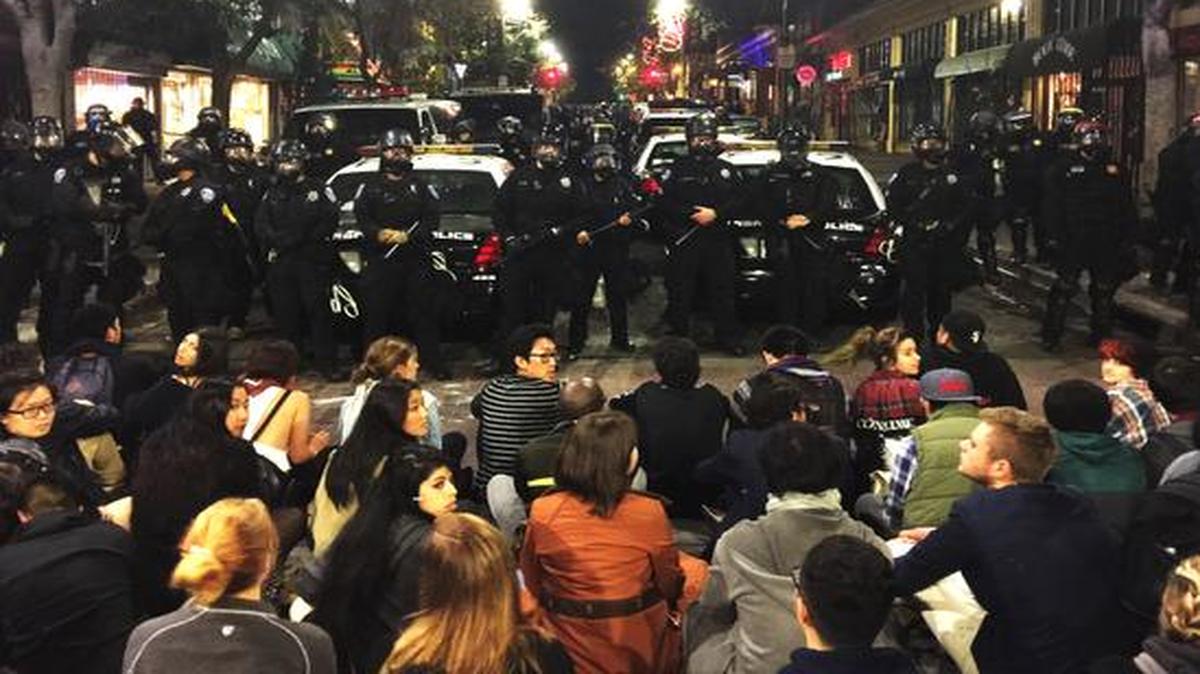 
Six people were arrested in Berkeley, California, when a protest over police killings turned violent.
