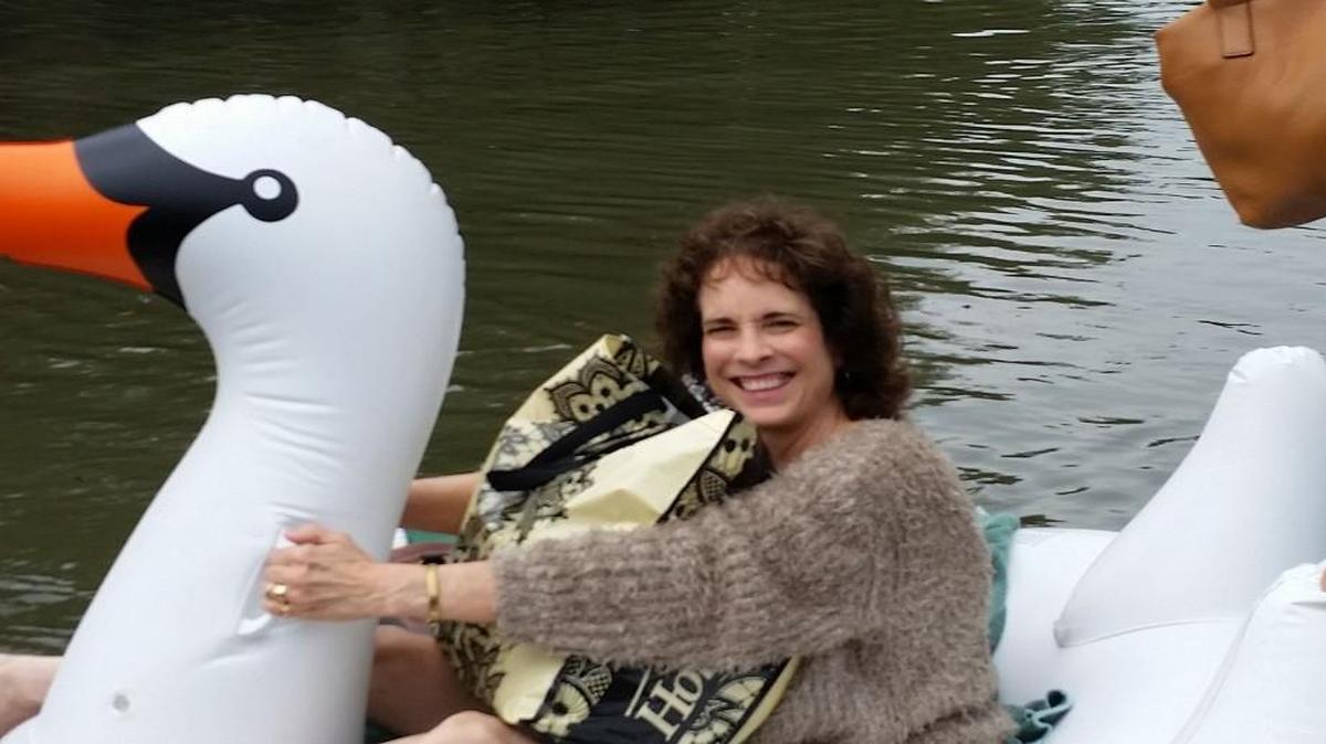 Midwife Cathy Allen Rude found a clever way to get to work during the flooding
