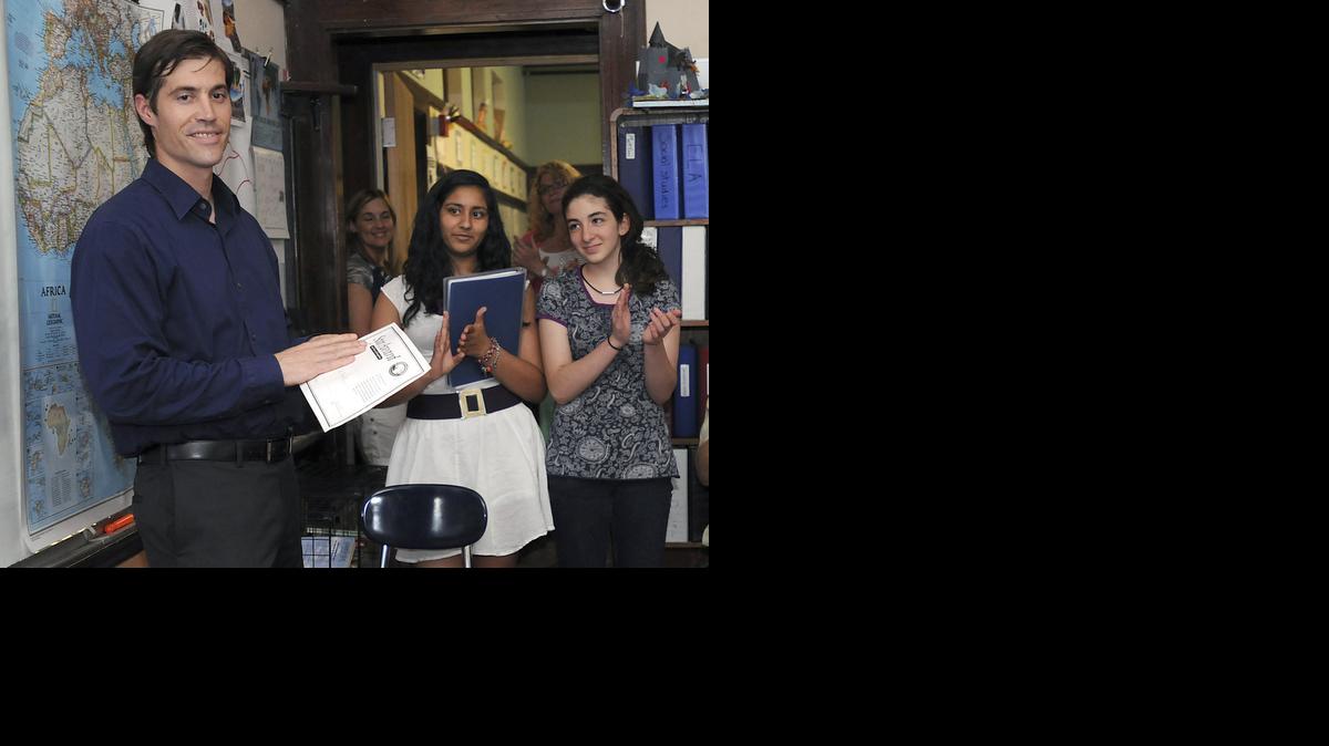 
Journalist James Foley receives applause from students in 2011 at the Christa McAuliffe Regional Charter Public School in Framingham, Mass. 

