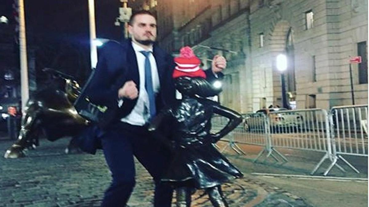 This photo taken by Facebook user Alexis Kaloyanides of a man simulating a sexual act on the “Fearless Girl” statue on Wall Street has gone viral.