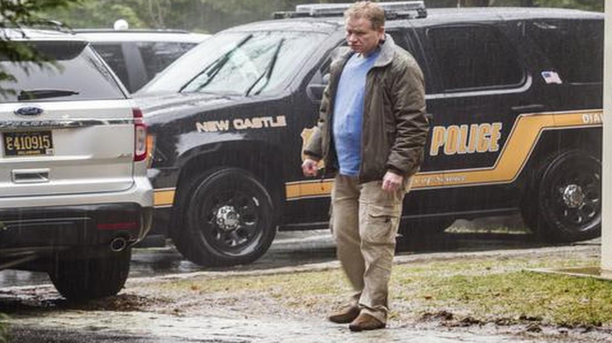 
A security official stands at the end of the driveway leading to Vice President Joe Biden's home Sunday in Greenville, Del.
