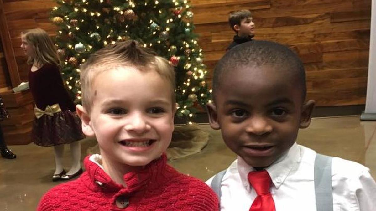 Jax Rosebush (left) asked his mom for a haircut that would make him look like his best friend, Reddy, so their teacher couldn’t tell them apart. This photo of the boys has gone viral.