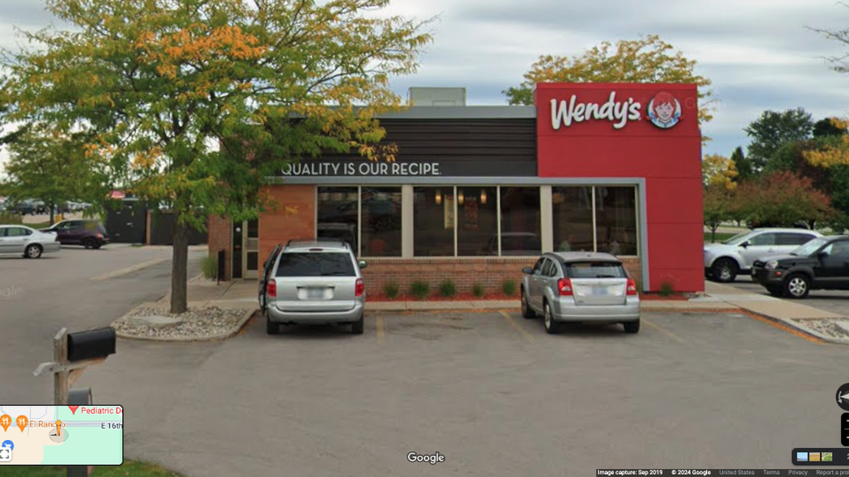 A man died after he was thrown off a vehicle driven by his wife outside a Wendy’s, Michigan authorities say. His wife is now arrested.