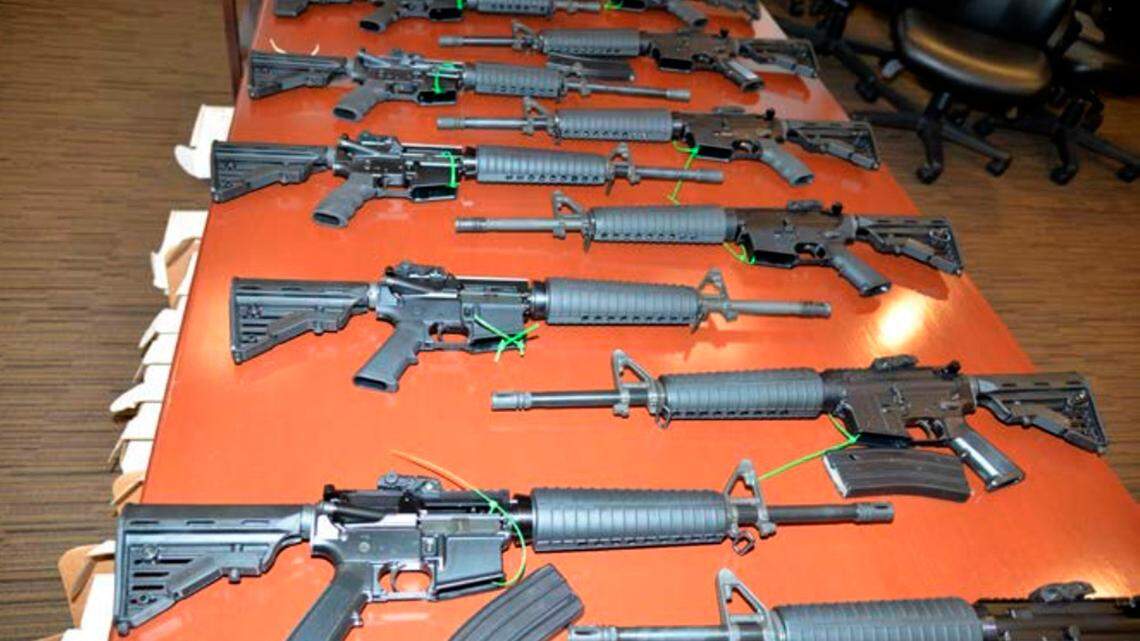 This undated photo shows .223-caliber rifles prosecutors said were manufactured by Mahde and Moyad Dannon in Indiana.