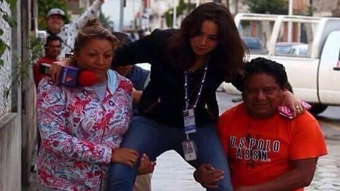 This image of Mexican TV reporter Lydia Cumming being carried through a flooded street while on assignment last week got her into a lot of hot water.