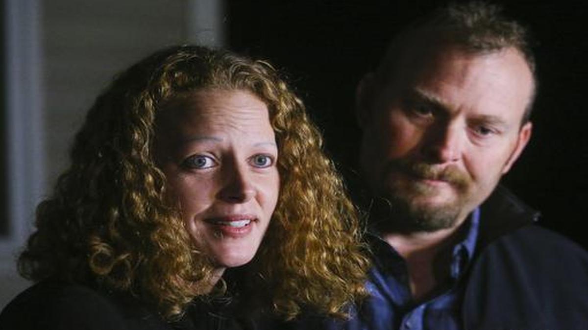 
Kaci Hickox, a nurse who treated Ebola patients in West Africa, and boyfriend Ted Wilbur take questions from the media outside their home in Fort Kent, Maine
