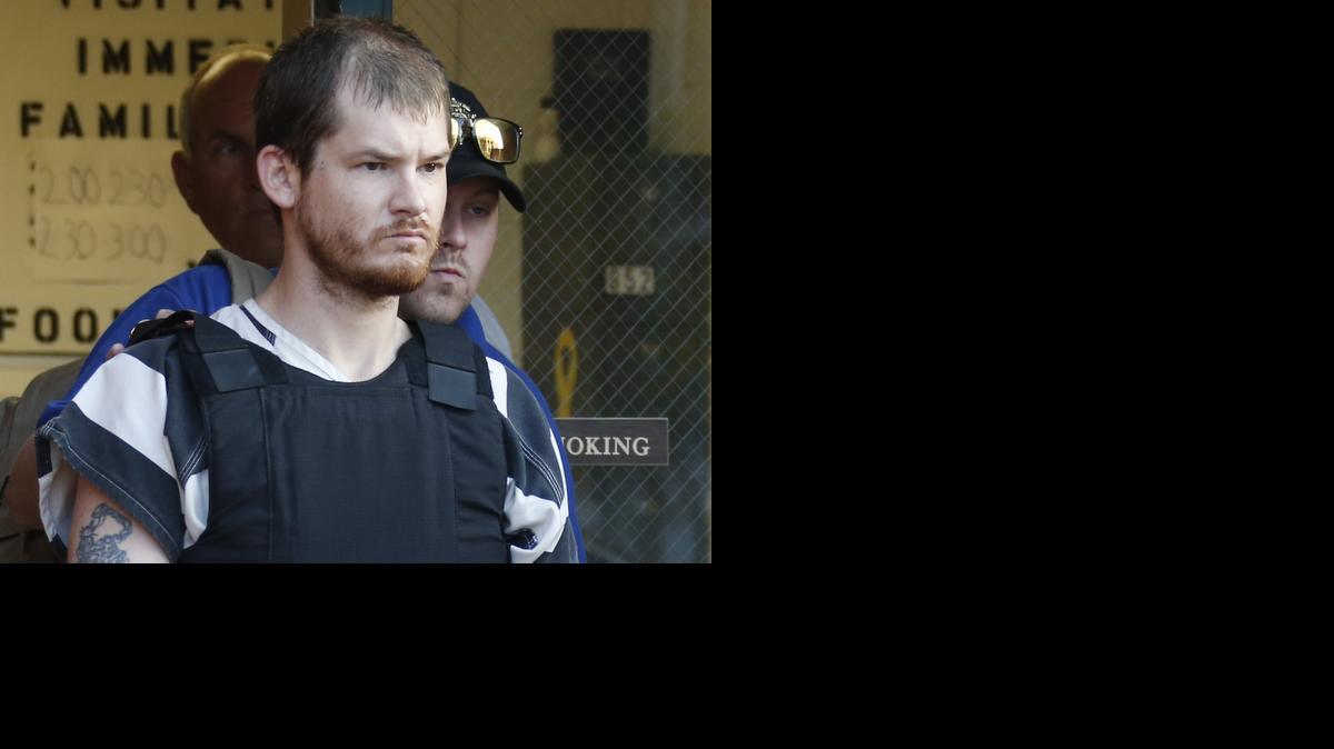 
Timothy Ray Jones Jr., is escorted by lawmen out of the Smith County Jail in Raleigh, Miss., Thursday, Sept. 11.
