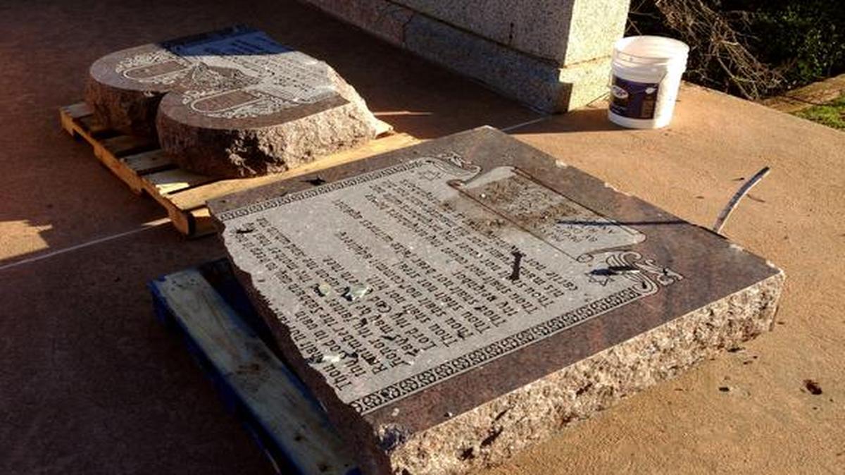 
The damaged remains of a Ten Commandments monument are gathered on the Oklahoma State Capitol grounds Friday
