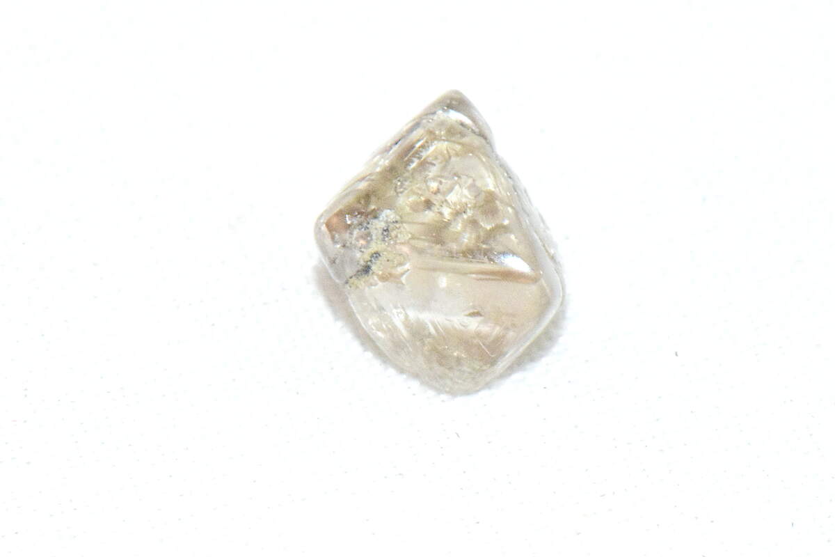 The diamond has a “smooth, rounded shape and beautiful metallic luster.”