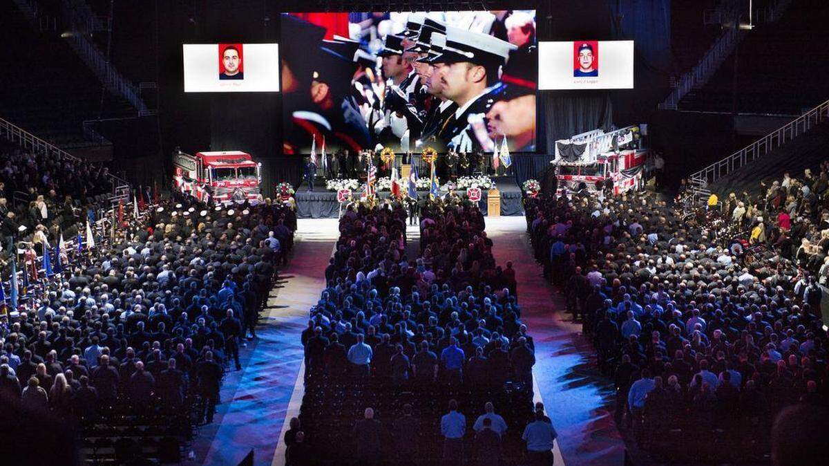 Thousands attended the community memorial service for Kansas City firefighters Larry Leggio and John Mesh in October 2015. The ceremony was held in the Sprint Center.
