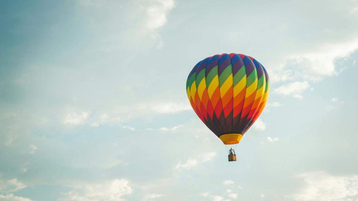 A hot air balloon, not the one pictured, crashed after an electrical current passed through it, officials say.