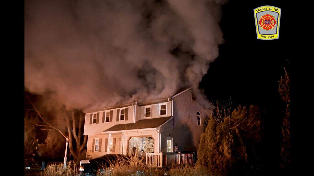 Firefighters battled a house fire started by a father accused of setting himself and the home ablaze while his family was inside, Pennsylvania police say.