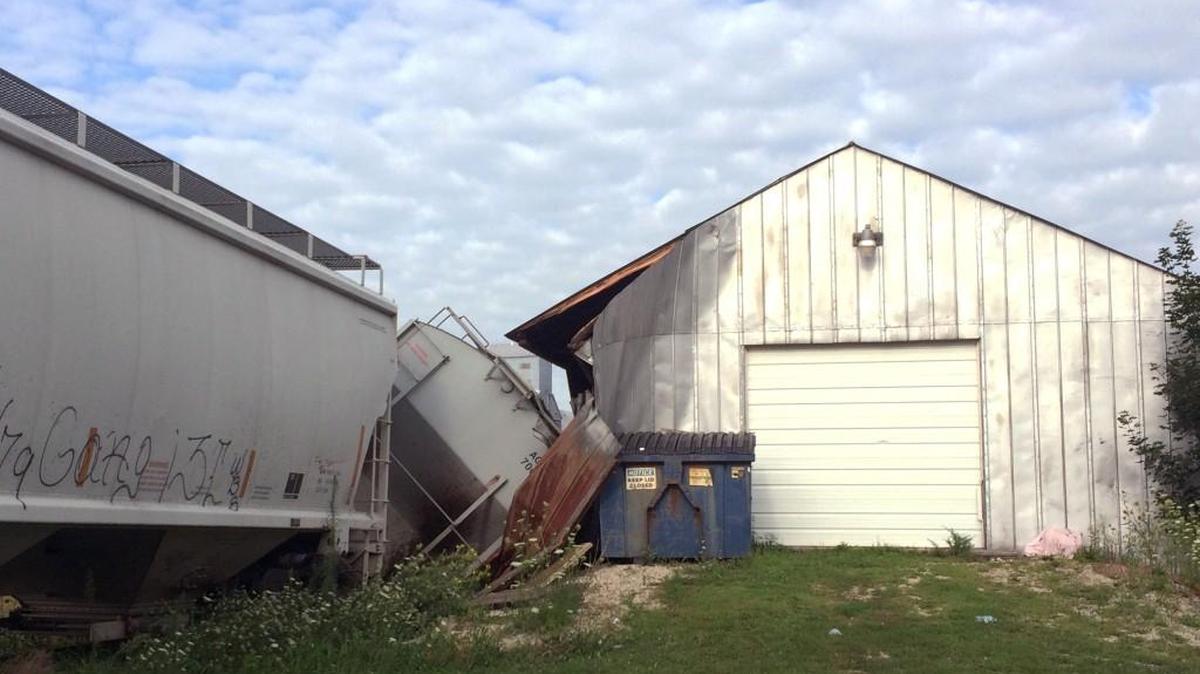A freight train car that derailed in Charles City, in northern Iowa, derailed into and damaged a trackside tavern called DeRailed early Tuesday.