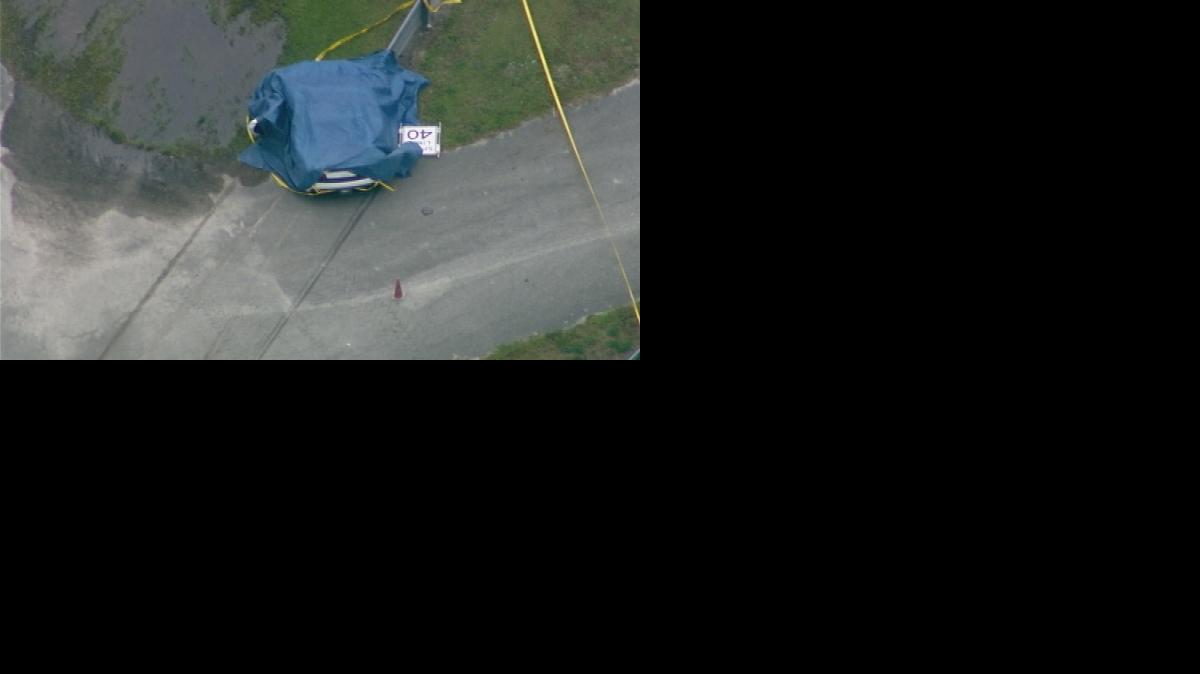 
This aerial image taken from a video provided by WFTV shows the scene after a deadly crash at the Exotic Driving Experience at Walt Disney World, Sunday
