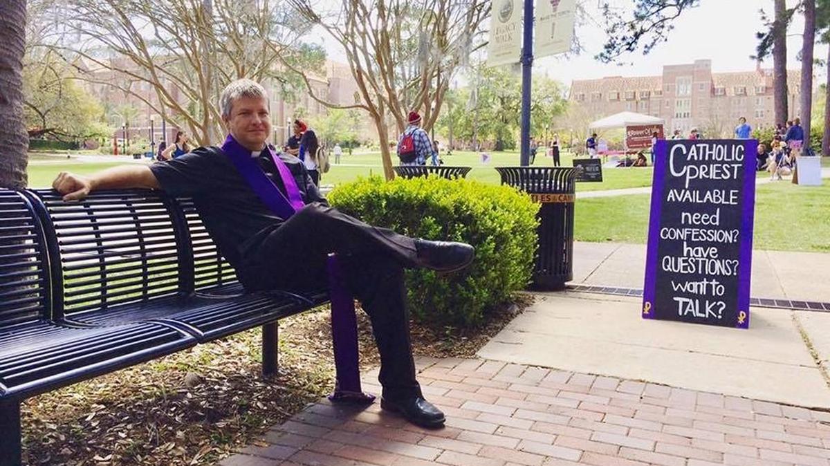 The Rev. Tim Holeda, chaplain of the Catholic Student Union at Florida State University, is hearing open-air confessions on the Tallahassee campus on Fridays during Lent.