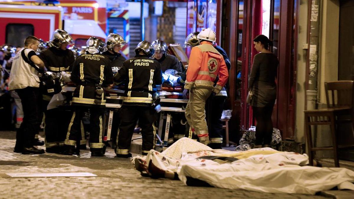 Rescue workers aided victims of a series of terror attacks Friday in Paris. The rampage across the city represented the deadliest day of attacks in France since World War II.