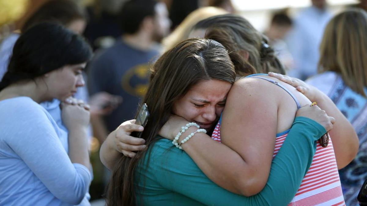 
Grief and angst gripped the small Oregon community of Roseburg on Thursday after a gunman went on a rampage at a community college there. Jessica Vazquez (left) hugged her aunt, Leticia Acaraz, as they awaited word on Acaraz’s daughter.
