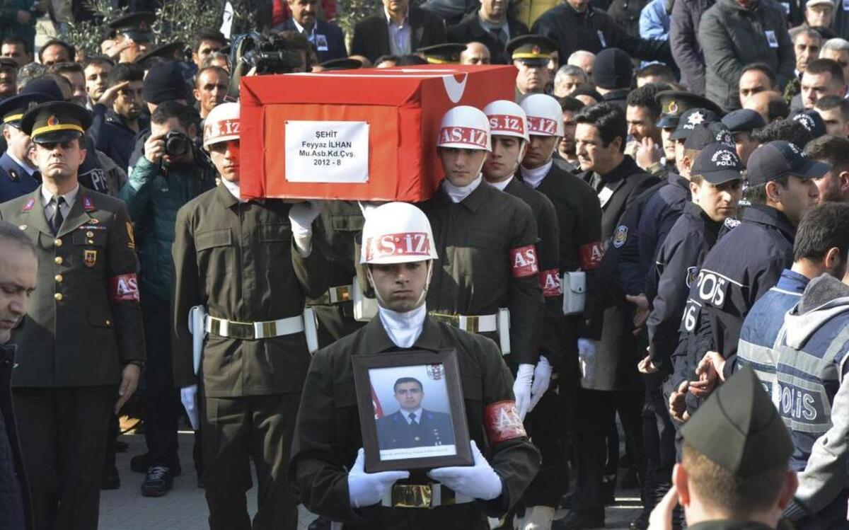 Turkish soldiers carried the national-flag-draped coffin of Sergeant First Class Feyyaz Ilhan, killed in Ankara’s explosion Wednesday, during his funeral Thursday in Bursa in northeastern Turkey. Turkey blamed Kurdish militant groups at home and in neighbouring Syria on Thursday for the deadly suicide bombing in Ankara and vowed strong retaliation for the attack, a development that threatens to further complicate the Syria conflict.