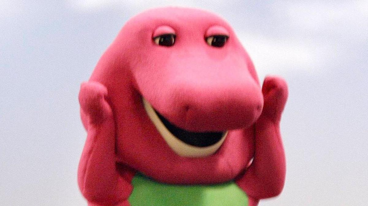 David Joyner wore a big purple costume for a decade in his job as Barney. He doesn’t hide his face in his current job — running a tantric sex business.