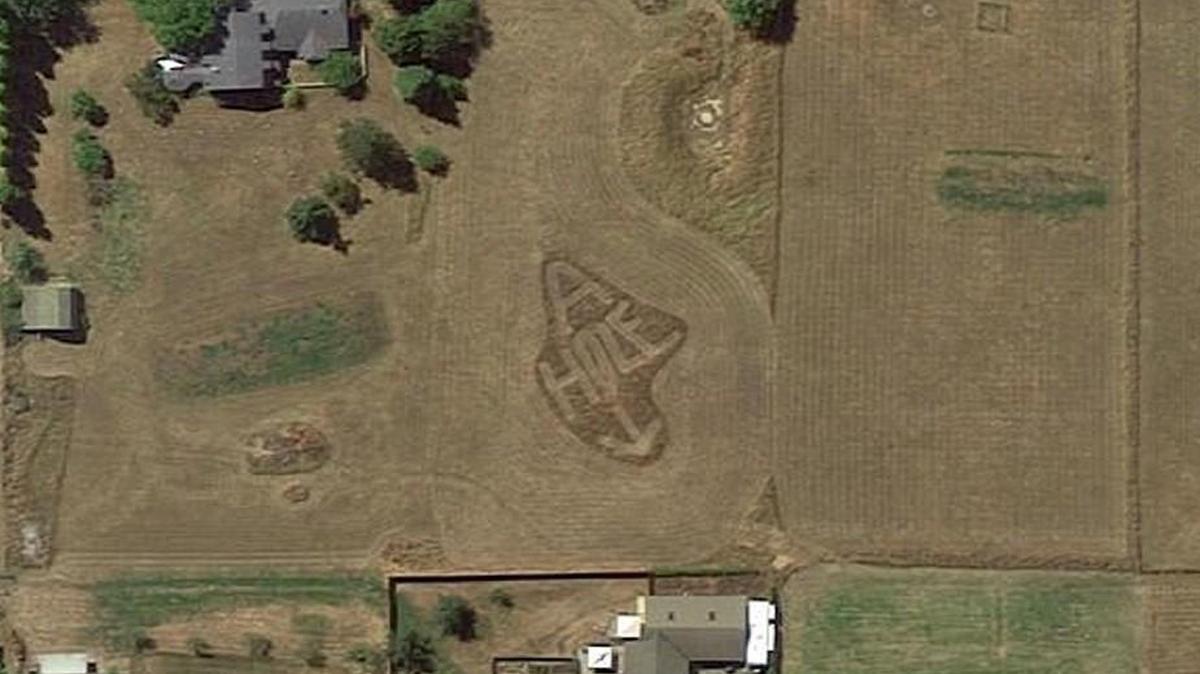 A neighbor having a dispute with another neighbor in Sequim, Wash., expressed frustration by mowing an obscenity into the lawn with a big arrow pointing at the neighbor’s house. Google Earth took a photo of it, and Reddit made the photo go viral.