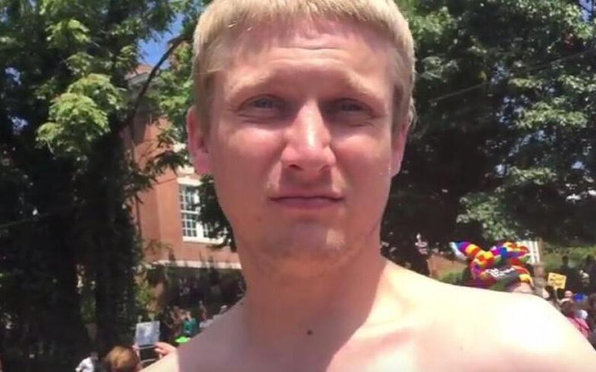 A white supremacist was exposed in Charlottesville, Va., after removing his uniform. He said he was there “for the fun.”