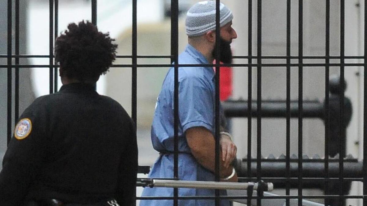 Adnan Syed enters Courthouse East in Baltimore before a hearing last winter.