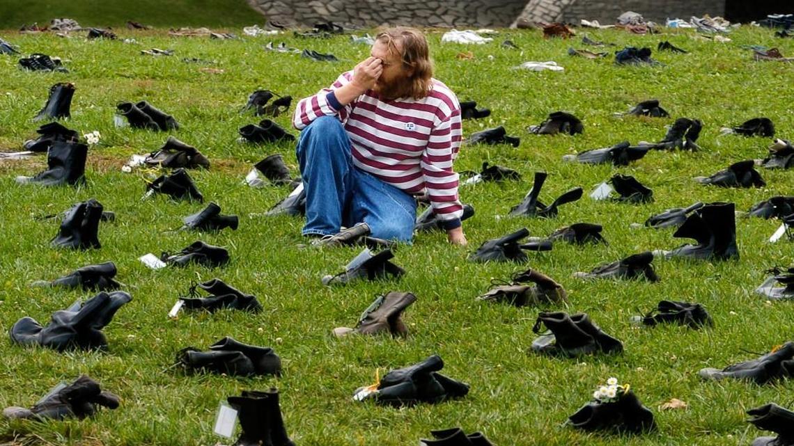 A traveling exhibit called “Eyes Wide Open” came to Kansas City in 2004. Boots represented casualties of the war in Iraq. High casualties from the United States’ involvement in wars over the past 15 years may have tipped the 2016 presidential election away from Hillary Clinton, a new study suggests.