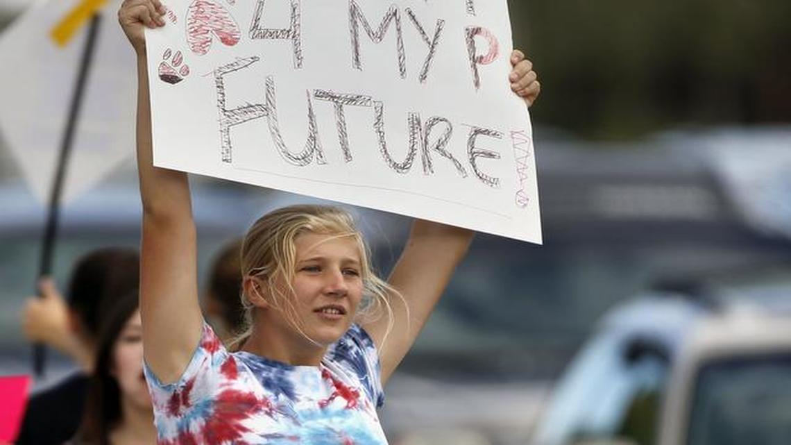 
Pamona High School student Ciana Vrtikapa protested on Tuesday against a Jefferson County School Board proposal to emphasize patriotism and downplay civil unrest in the teaching of U.S. history, in Arvada, Colo.

