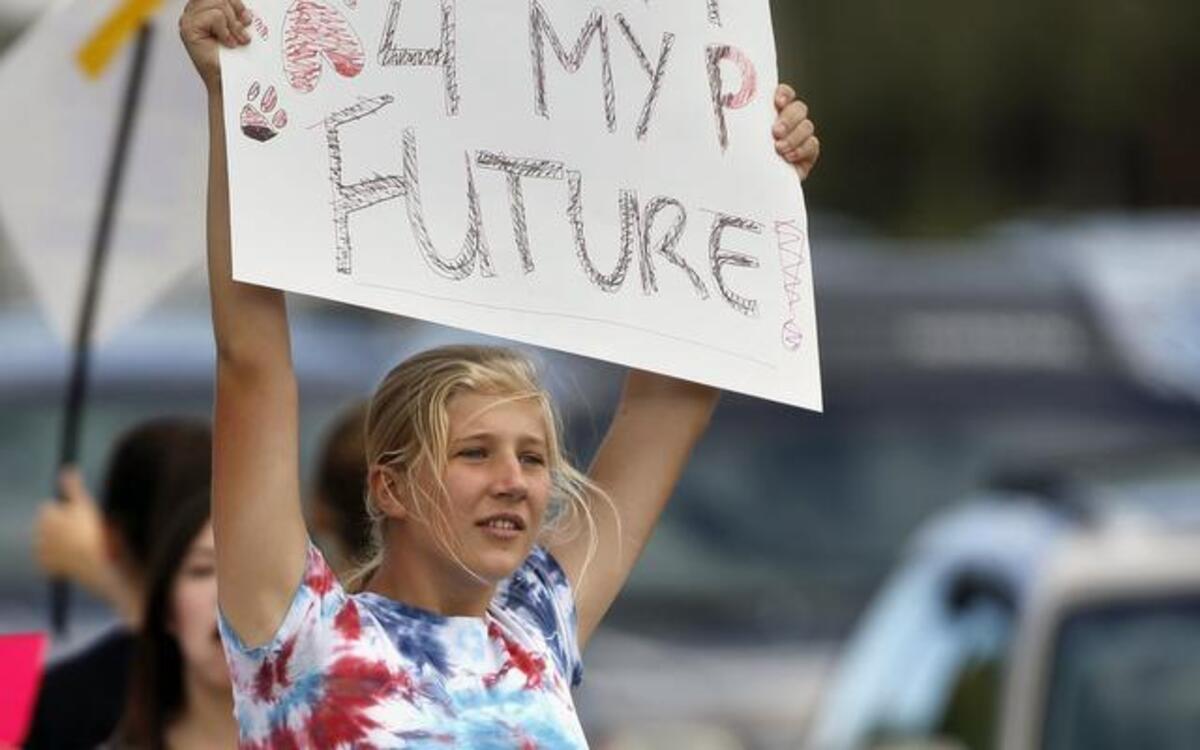 
Pamona High School student Ciana Vrtikapa protested on Tuesday against a Jefferson County School Board proposal to emphasize patriotism and downplay civil unrest in the teaching of U.S. history, in Arvada, Colo.
