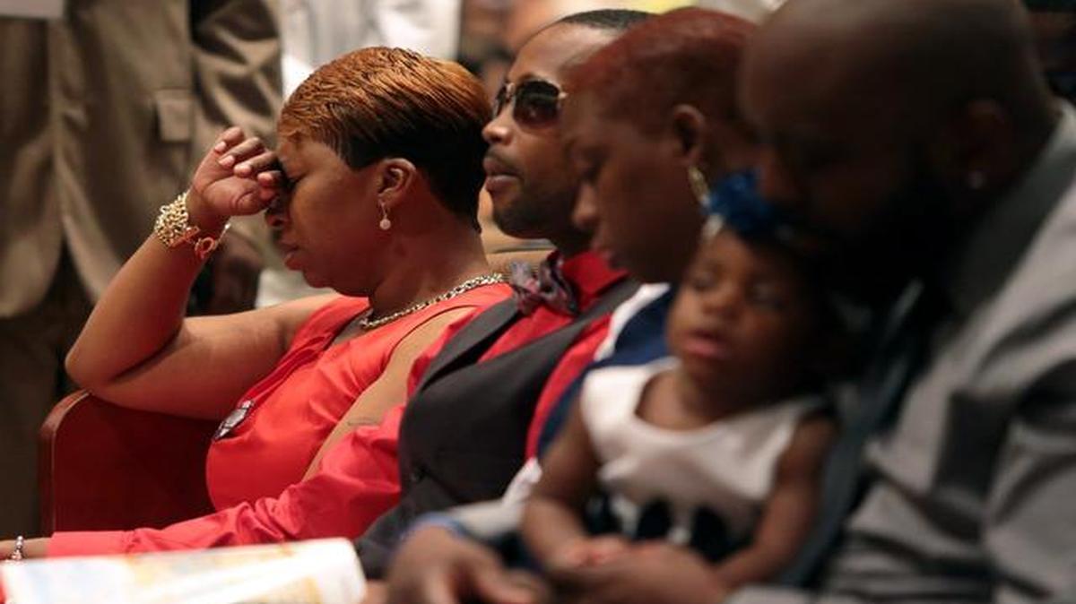 
Lesley McSpadden, Michael Brown’s mother, closed her eyes during the funeral service for her son Monday at Friendly Temple Missionary Baptist Church in St. Louis. 
