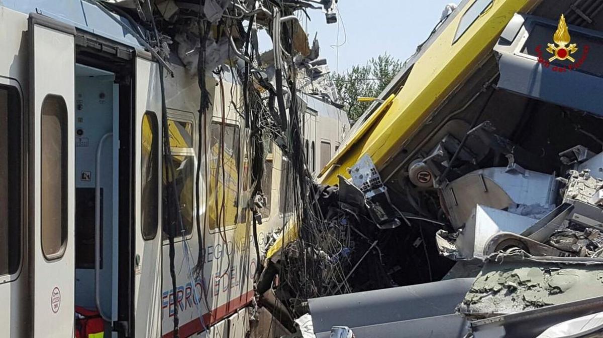 Crumpled wagon cars are seen after after two commuter trains collided head-on near the town of Andria, in the southern region of Puglia, killing several people, Tuesday, July 12, 2016.