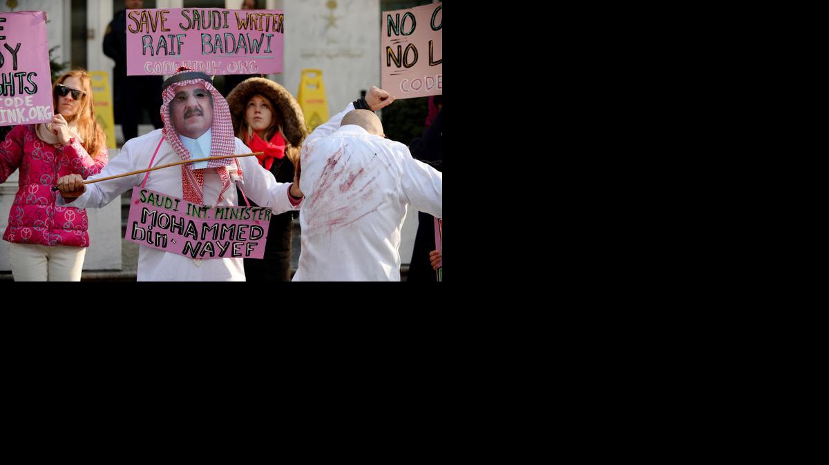 
Protesters hold a rally in protest of the persecution and punishment of Saudi activist Raif Badawi, who was sentenced to 1,000 lashes simply for publishing a blog criticizing the Saudi monarchy
