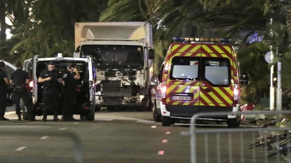 Thursday night in Nice, France, police stood near a van, with its windscreen riddled with bullets, on the Promenade des Anglais.