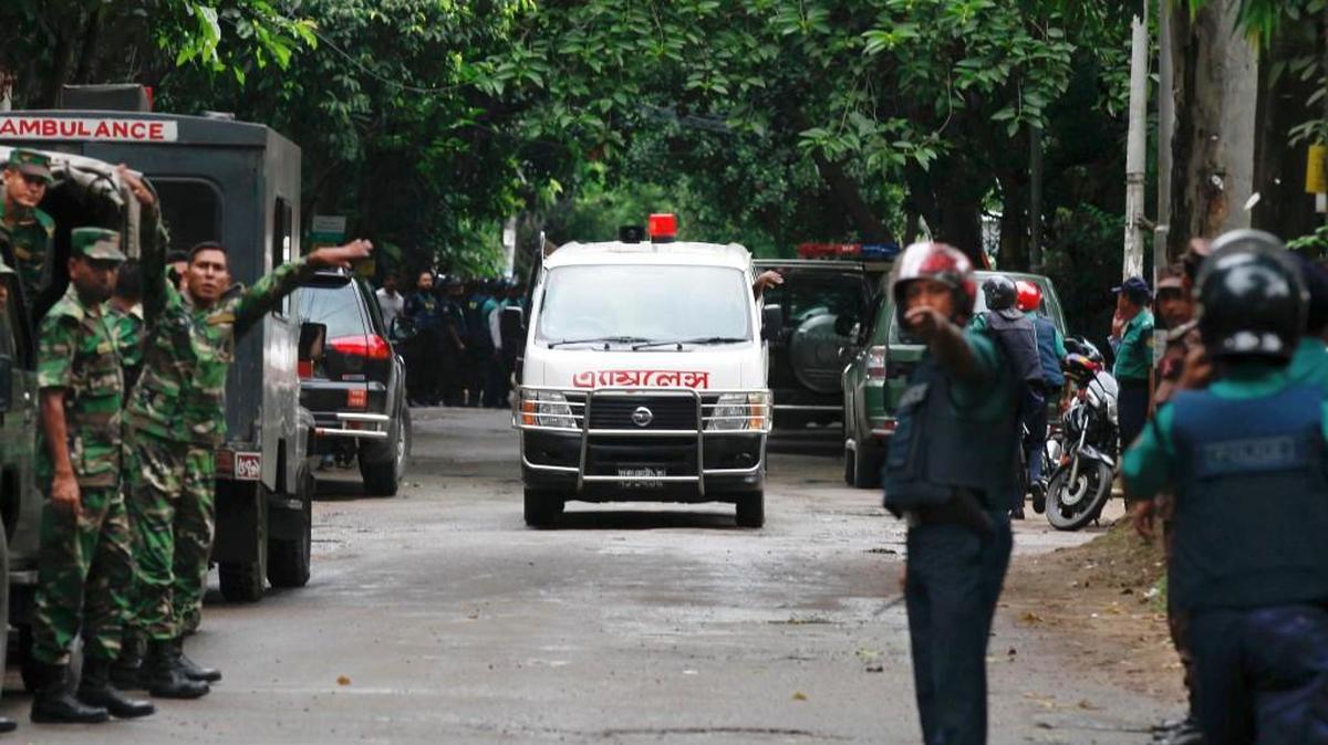 An ambulance transports bodies found at a restaurant popular with foreigners after heavily armed militants attacked it on Friday night in Dhaka, Bangladesh, Saturday, July 2, 2016. Bangladesh forces stormed the restaurant where heavily armed militants held dozens of people hostage for 10 hours Saturday morning.