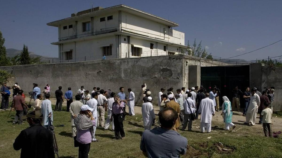 Al-Qaida leader Osama bin Laden was caught and killed in this compound in Abbottabad, Pakistan, in May 2011, during a U.S. raid. Two days later, townsfolk gathered at the scene.