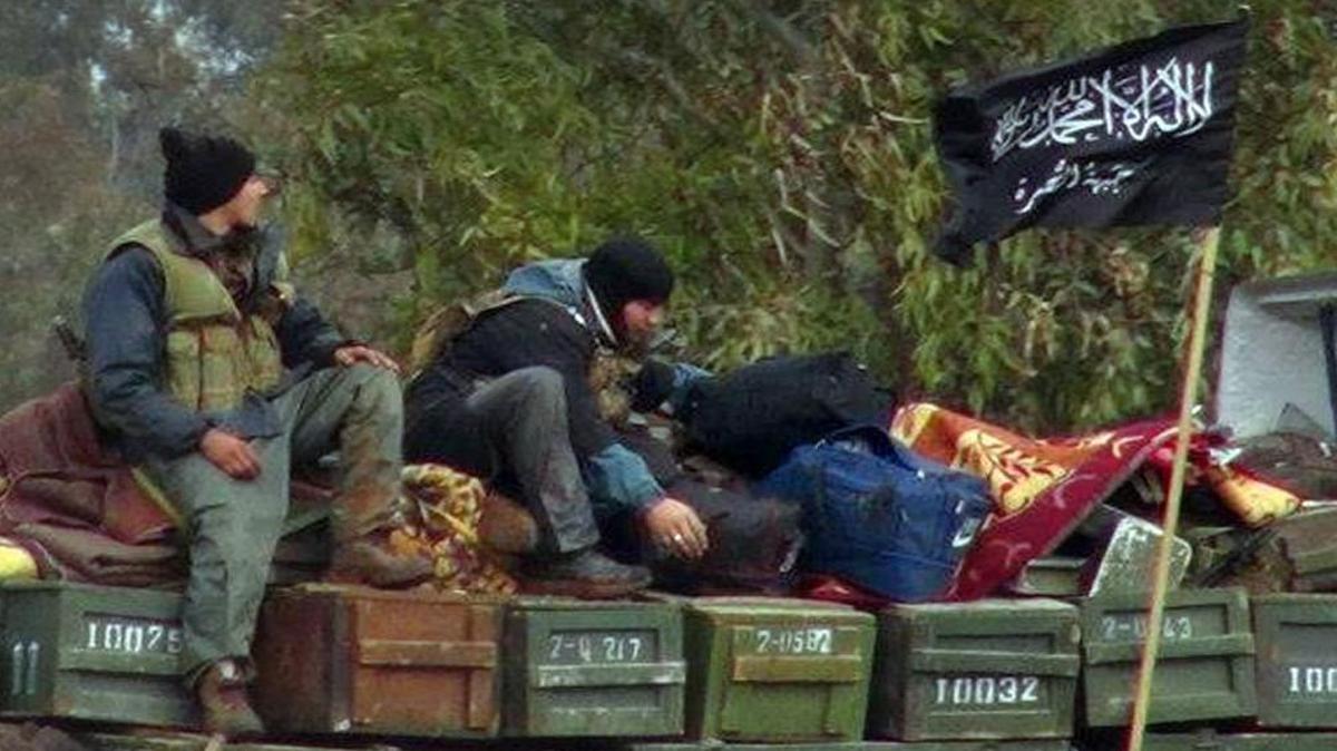 Fighting by rebel groups has continued for years in Syria, assisted by efforts from other countries to supply them with arms. In early 2013, rebels from the al-Qaida affiliate Jabhat al-Nusra sat on a truck of captured ammunition in Idlib province in northern Syria.
