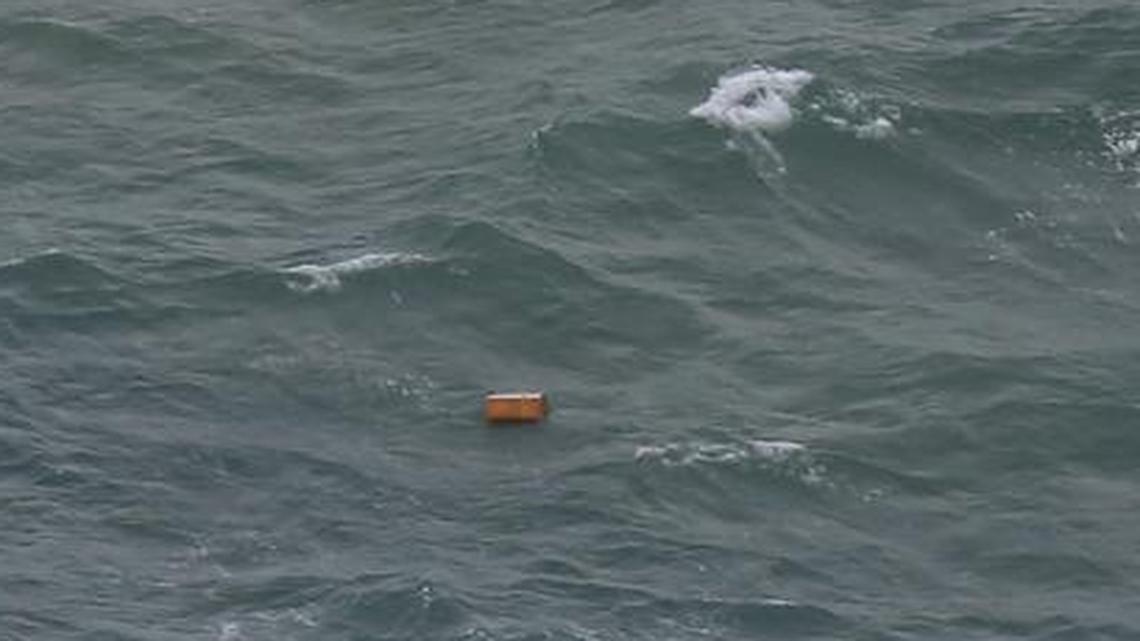 
This aerial photo shows piece of objects floating on the waters of Java Sea near Central Kalimantan province, Indonesia, Tuesday
