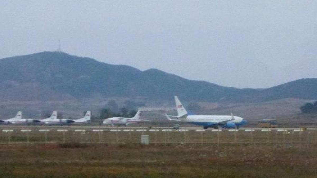 
What appears to be a United States Air Force passenger jet, right, is parked on the tarmac of Sunan International Airport in Pyongyang, North Korea, Tuesday, Oct. 21, 2014. 
