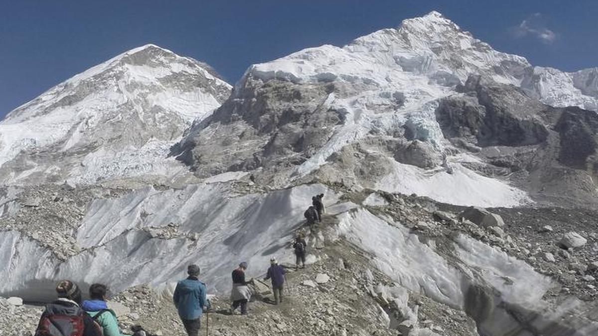 In February, trekkers passed through a glacier at the Mount Everest base camp as the climbing season returned in Nepal.