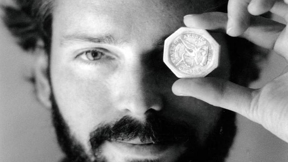 
In this November 1989 file photo, Tommy Thompson holds a $50 pioneer gold piece retrieved earlier in 1989 from the wreck of the gold ship Central America. 

