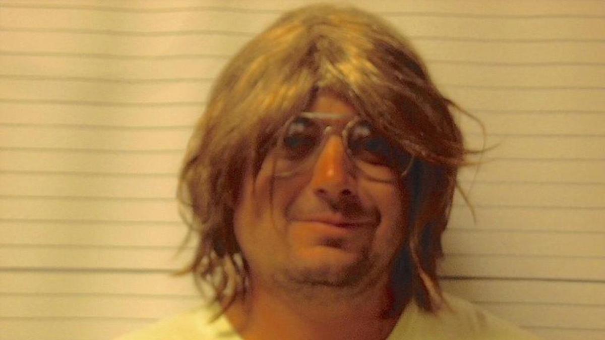 Brandon Trice Harmon wanted an “epic and savage” mugshot. So he wore a blond wig and fake glasses when he posed last month.