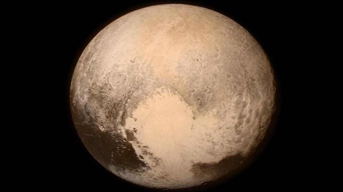 
This image provided by NASA shows Pluto from the New Horizons spacecraft. The United States is now the only nation to visit every single planet in the solar system.
