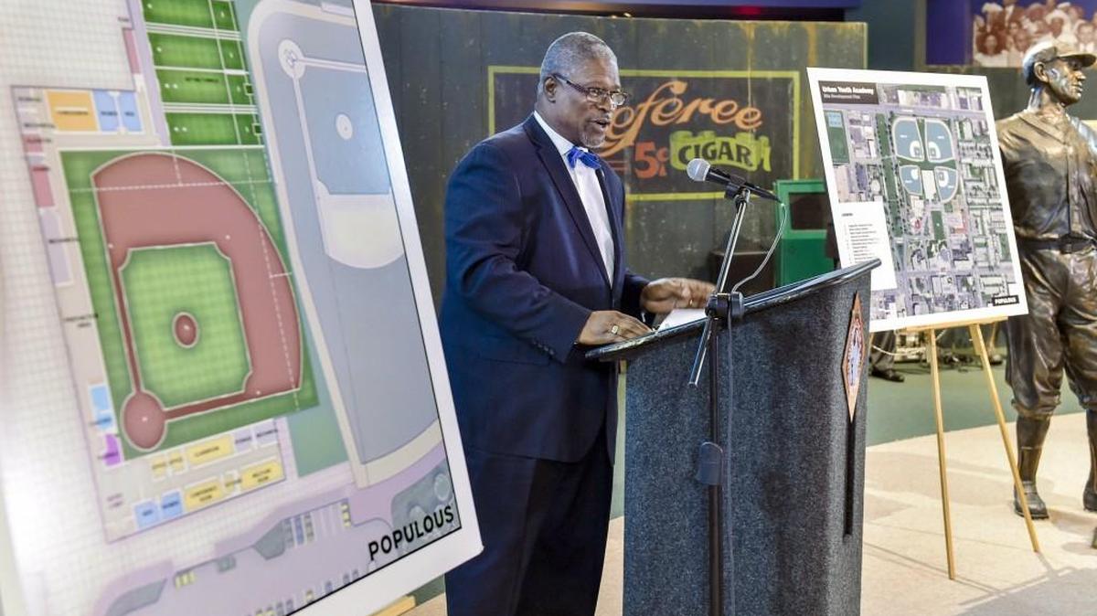 Kansas City Mayor Sly James spoke at the September announcement of an urban youth baseball academy (on posters) to be built at Parade Park.