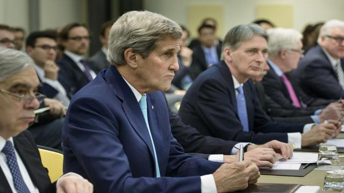 
U.S. Secretary of State John Kerry, second left, U.S. Secretary of Energy Ernest Moniz, left, British Foreign Secretary Philip Hammond, center, Russian Deputy Foreign Minister Sergei Ryabkov, second right, and German Foreign Minister Frank Walter Steinmeier
